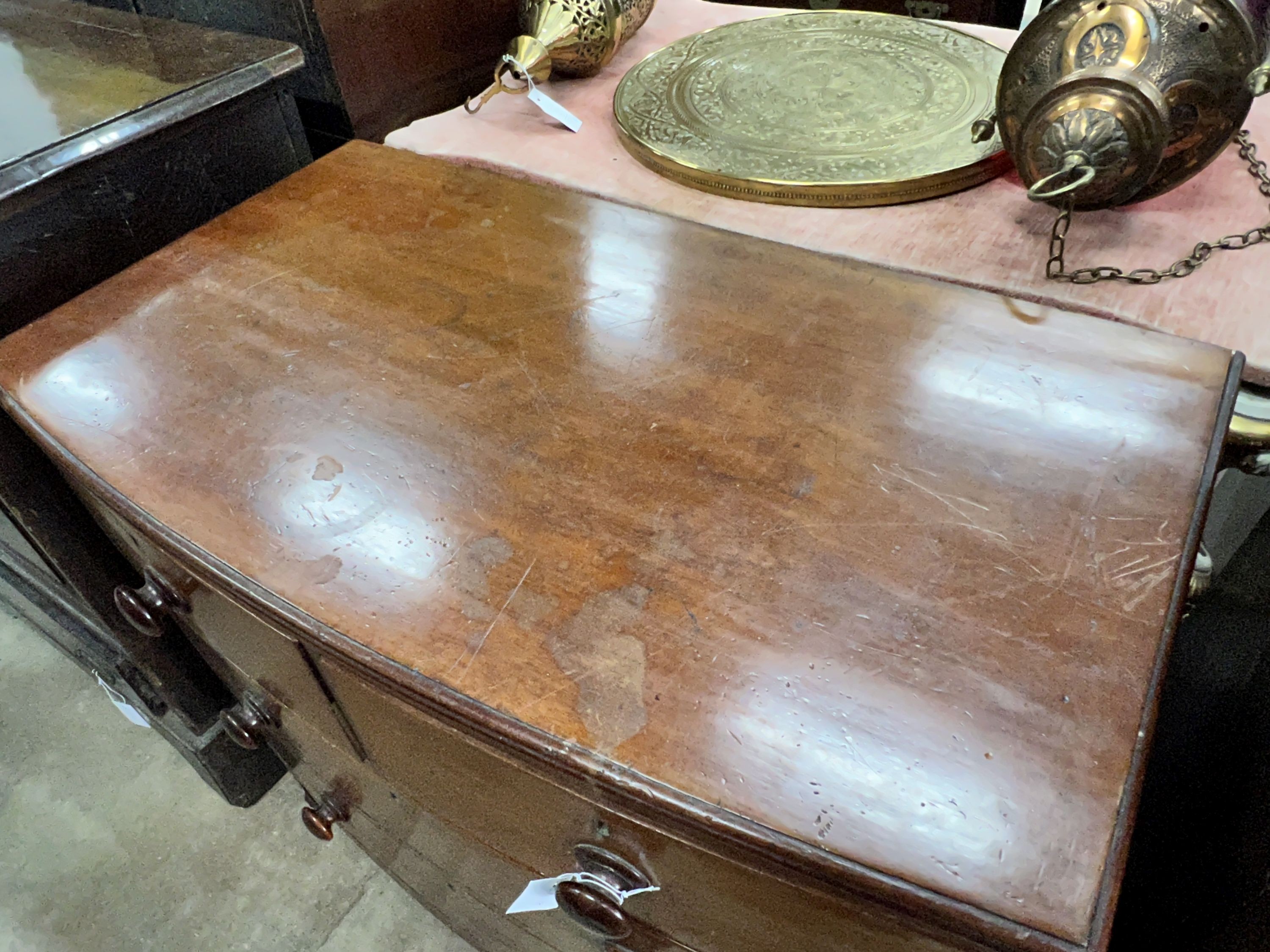 A small Regency mahogany four drawer bowfront chest, width 89cm, depth 50cm, height 87cm